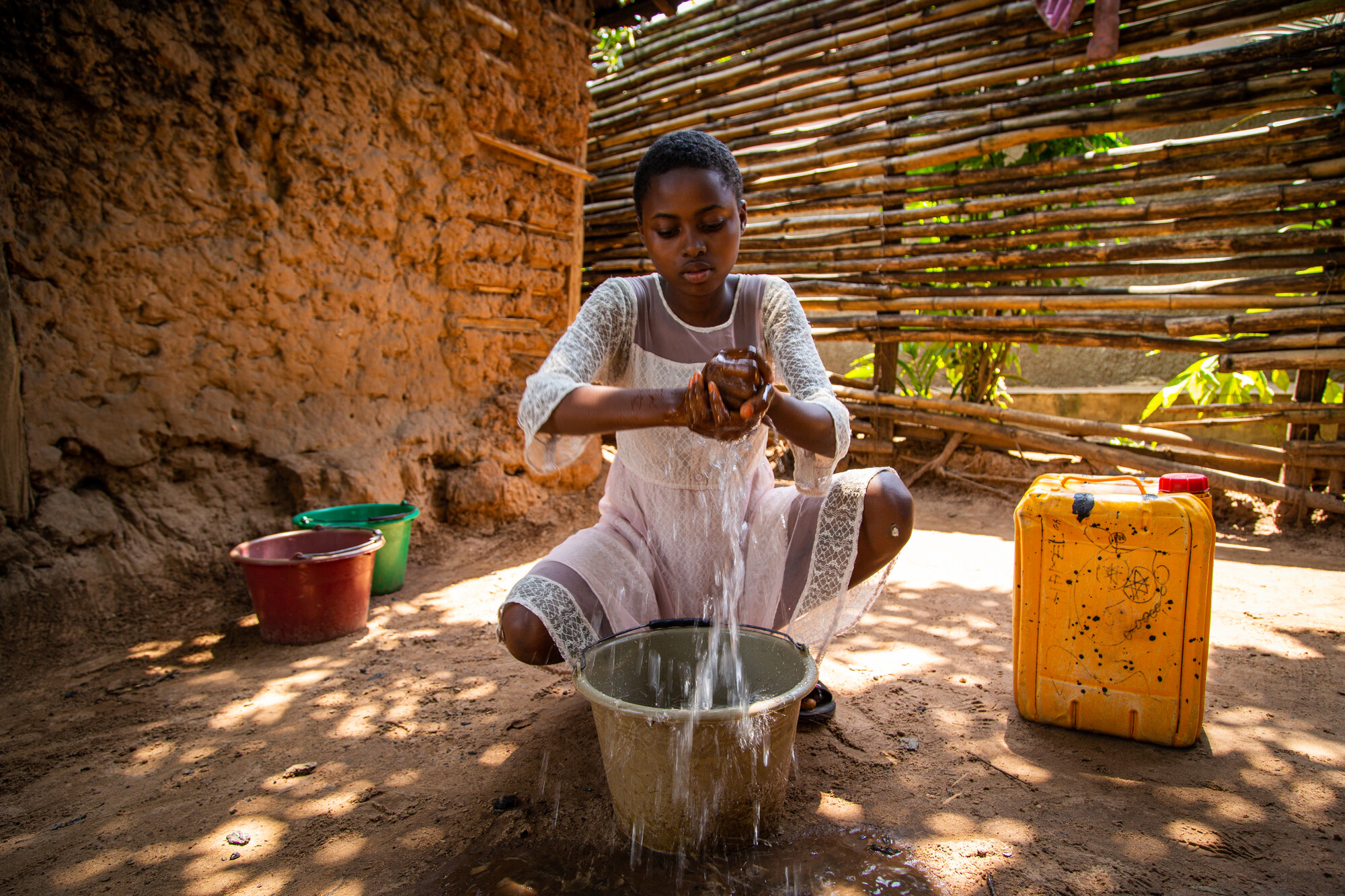 Girl washing her hands