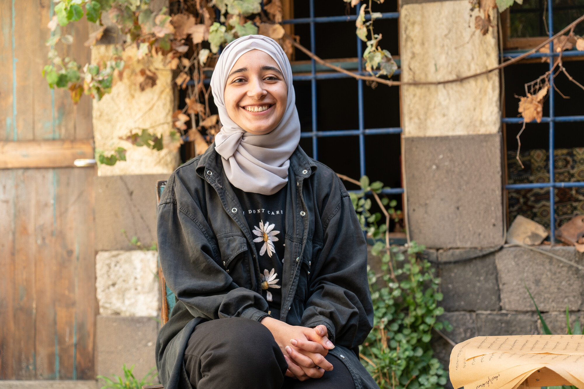 Woman smiling at the camera.